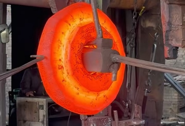 Open-die forging process for the manufacture of ASTM A707 L5 flanges.